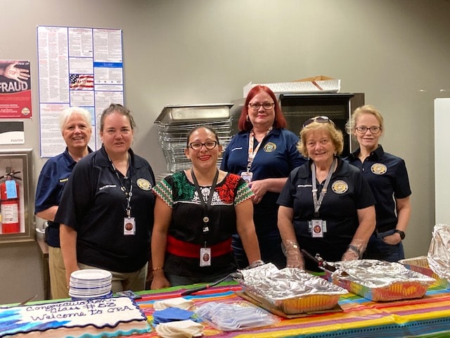 PCPAAA volunteers at community event table